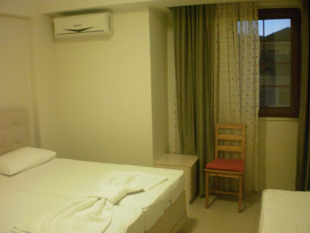 Delos Hotel Бозджаада Номер фото